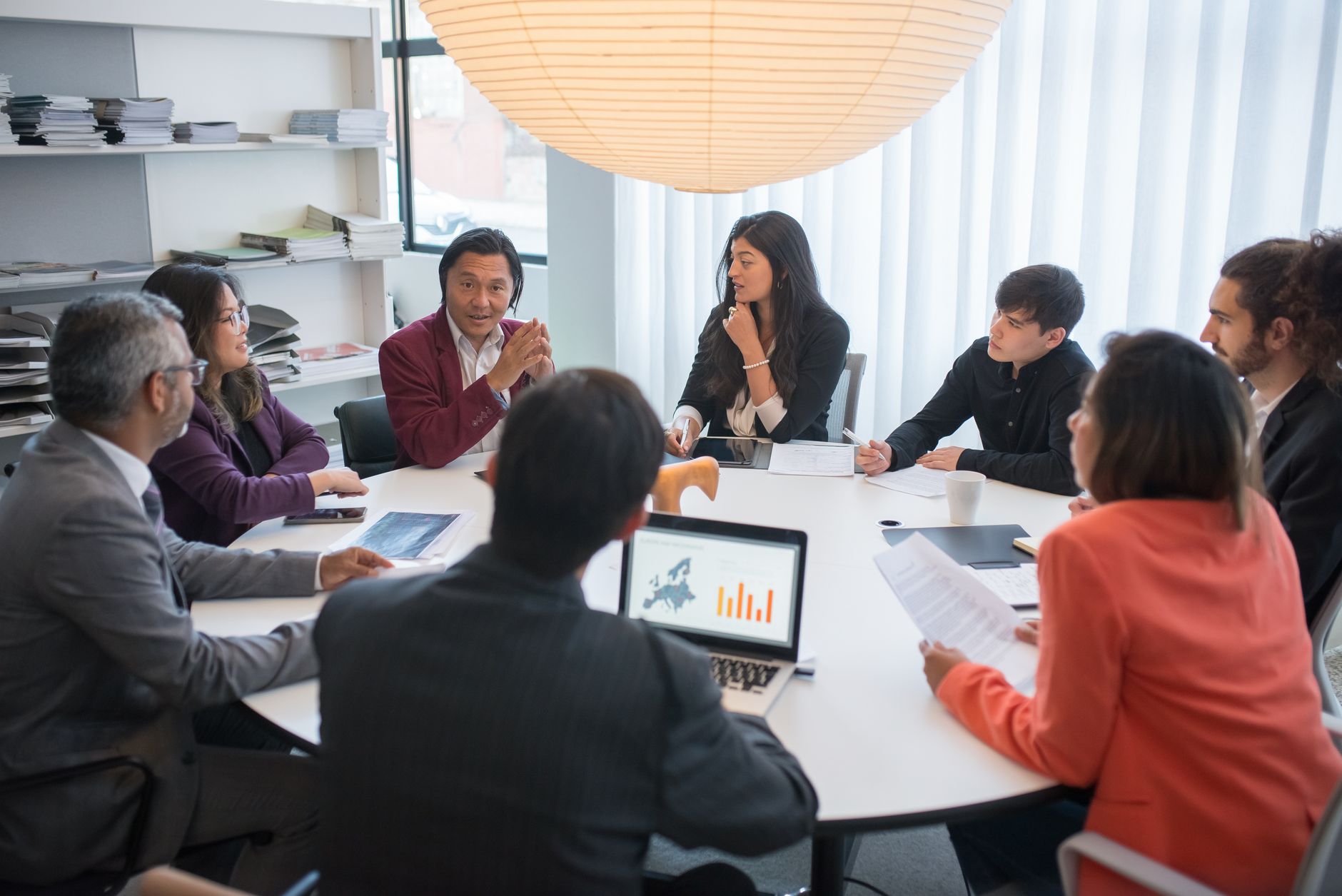 Senior executives analyzing market cycles data